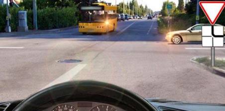 Who do you have to give way to if you intend to continue driving straight ahead?