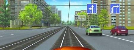 In this situation is the driver allowed to drive on the railway lines?