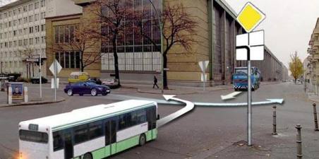 The passenger car will drive through the intersection: