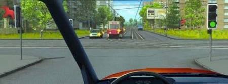 The driver crossing the intersection straight