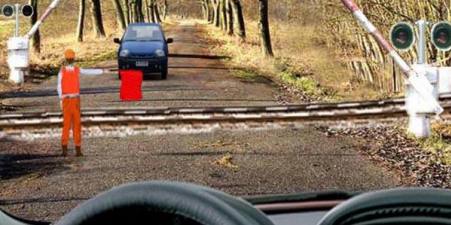 Is it allowed to pass a railroad crossing in this situation?